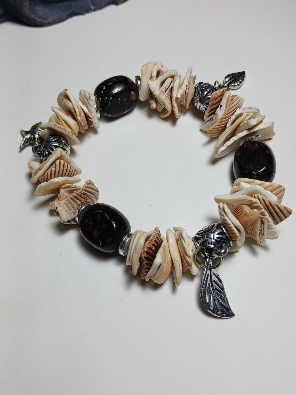 Shell Chip Stretch Bracelets (2) with Dark Stone Beads and Leaf Charms